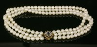 Lot 535 - A three-row uniform cultured pearl choker