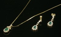 Lot 575 - An emerald and diamond