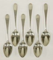 Lot 179 - A matching set of eight George III silver pointed old english pattern dessert spoons