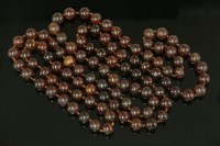 Lot 331 - A single row uniform amber bead necklace