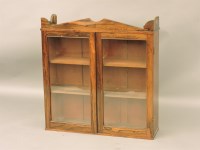 Lot 655 - A 19th century wall cabinet