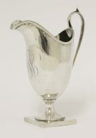 Lot 10 - A late 18th/early 19th century silver cream jug