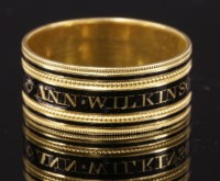 Lot 309 - A Regency gold memorial ring