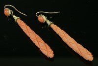 Lot 317 - A pair of carved coral drop earrings