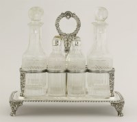 Lot 183 - A George III silver eight-bottle cruet stand
by Thomas Robins