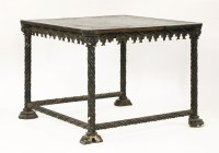 Lot 465 - An unusual ebony and ebonised writing table