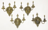 Lot 371 - A set of four gilt bronze double wall lights