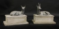 Lot 433 - A pair of recumbent lead deer