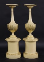 Lot 439 - A pair of modern carved and painted wooden pedestals