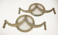 Lot 444 - A pair of bronze wall mounts