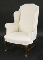 Lot 409 - A Georgian wing armchair