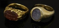 Lot 36 - A high carat gold hardstone oval intaglio ring