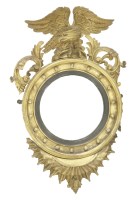 Lot 366 - A Regency period circular gilt wall mirror