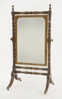 Lot 387 - A Regency mahogany cheval mirror