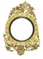 Lot 429 - A Regency gilt-framed convex mirror