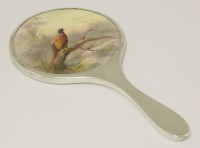 Lot 67 - A Royal Worcester silver-mounted hand mirror