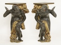 Lot 358 - A pair of carved wood blackamoors