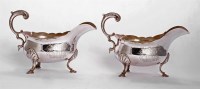 Lot 55 - A pair of George III silver sauce boats