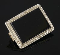 Lot 461 - An Art Deco onyx and diamond plaque brooch