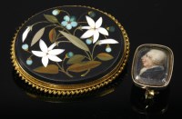 Lot 337 - A Victorian pietra dura gold plaque brooch