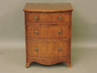 Lot 771 - A mahogany bow front three drawer chest