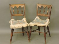 Lot 692 - A pair of elm chairs