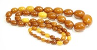 Lot 335 - A single row graduated amber bead necklace