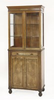 Lot 618 - A Regency style rosewood and brass inlaid display cabinet