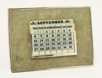 Lot 197 - A silver-mounted easel-backed shagreen desk calendar