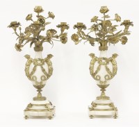 Lot 199 - A pair of gilt bronze and white marble urn candelabra