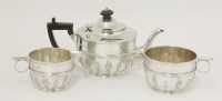 Lot 92 - An Edwardian silver three-piece tea set