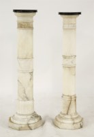 Lot 665 - A pair of alabaster columns