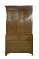 Lot 577 - A 19th century mahogany linen press