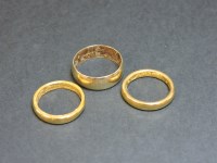 Lot 23 - Two 22ct gold wedding rings