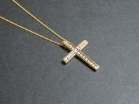 Lot 44 - An 18ct gold diamond set Latin style cross and chain