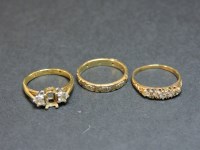 Lot 26 - An 18ct gold three stone diamond ring