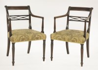 Lot 396 - A pair of Regency mahogany elbow chairs