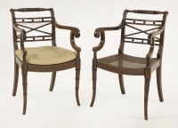 Lot 400 - A pair of Regency mahogany elbow chairs