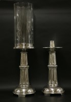 Lot 70 - A pair of large silver-plated candlesticks