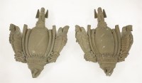 Lot 443 - A pair of cast bronze wall plaques