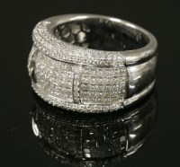 Lot 560 - A white gold diamond set band ring