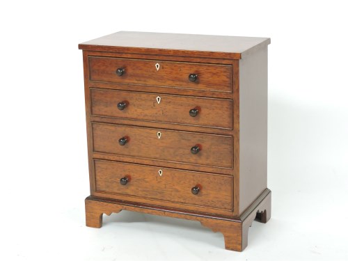 Lot 256 - A 20th century miniature mahogany chest
