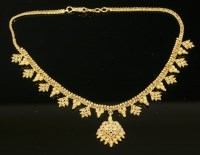 Lot 507 - An Indian high carat gold fringe necklace