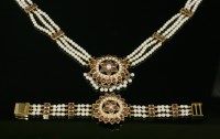 Lot 511 - An Indian high carat gold cultured pearl and garnet