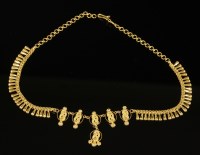 Lot 514 - An Indian high carat gold fringe necklace