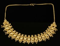 Lot 524 - An Indian high carat gold necklace