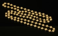 Lot 533 - An Indian high carat gold bead necklace