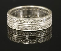 Lot 562 - A diamond set two-row