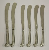 Lot 199 - A set of four 18th century Irish silver pistol handled knives with silver blades