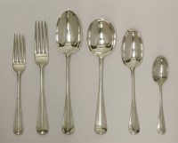 Lot 200 - A late Victorian/early 20th century silver rat-tail pattern flatware service